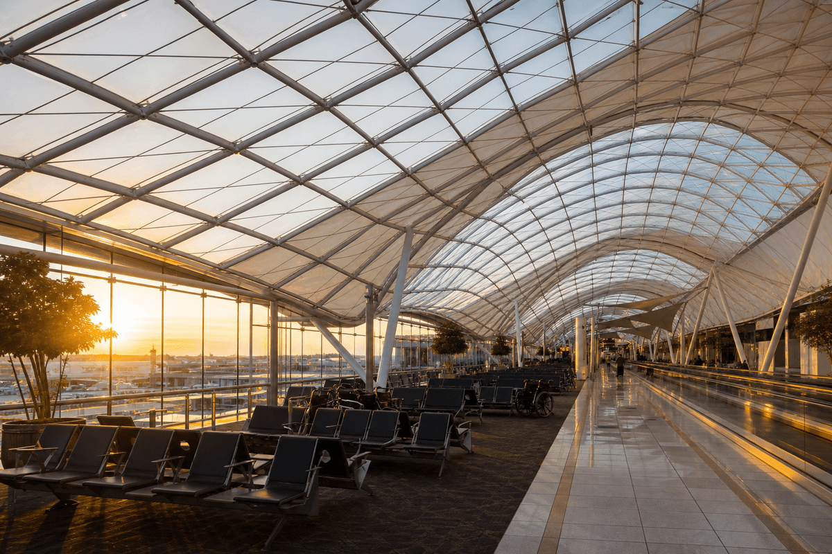 Airport concourse interior with sweeping ETFE skylight roof
