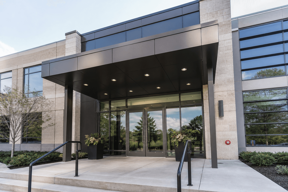 Commercial building entrance with elegant ETFE canopy