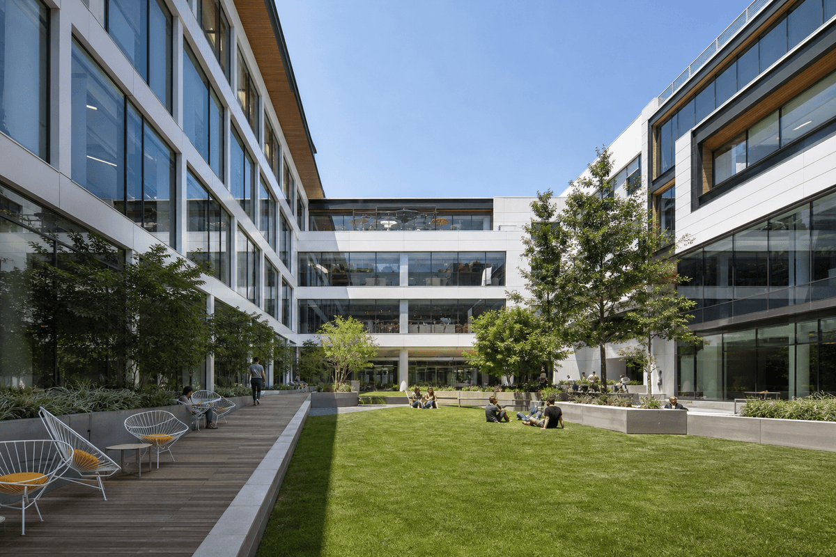 Corporate campus court with sweeping ETFE skylight