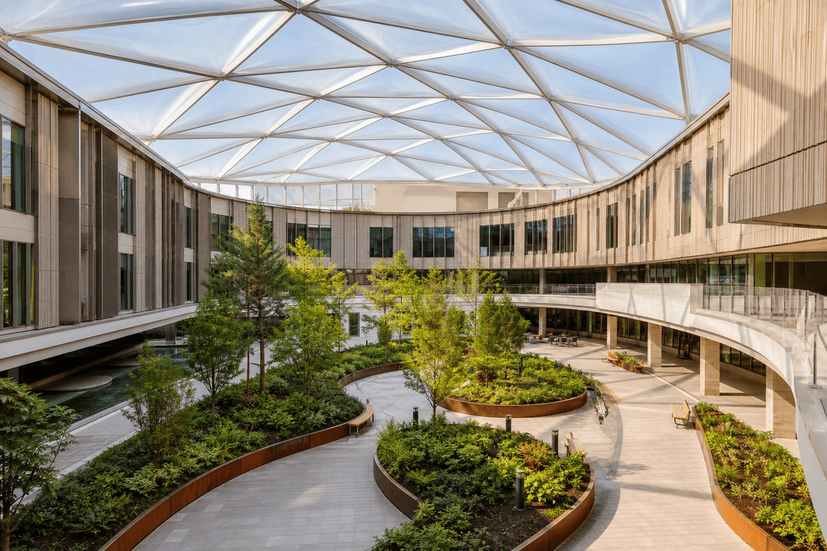 Healthcare courtyard with sweeping ETFE skylight roof