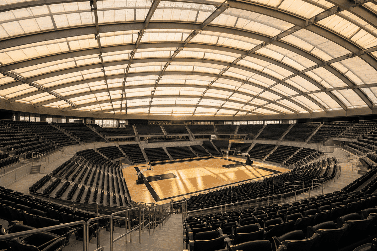 Daylit modern indoor sports arena with translucent ETFE roof