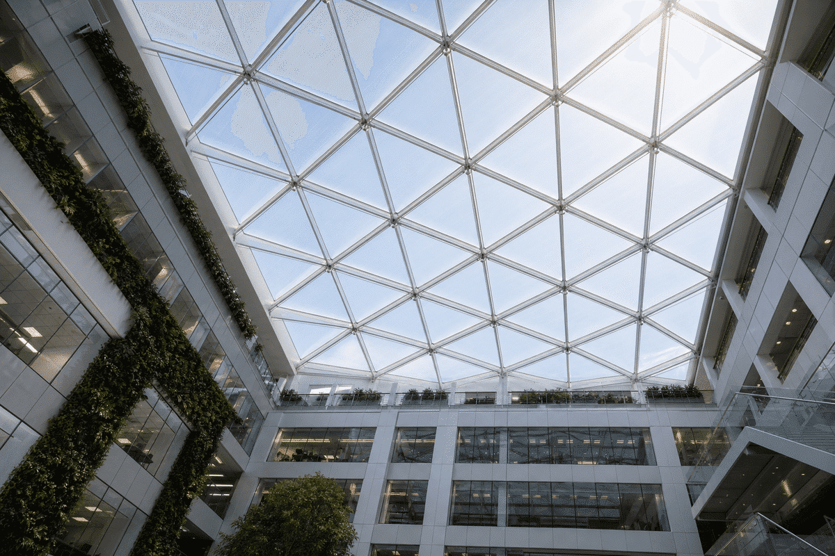 Office interior looking up at a daylit ETFE cushion roof