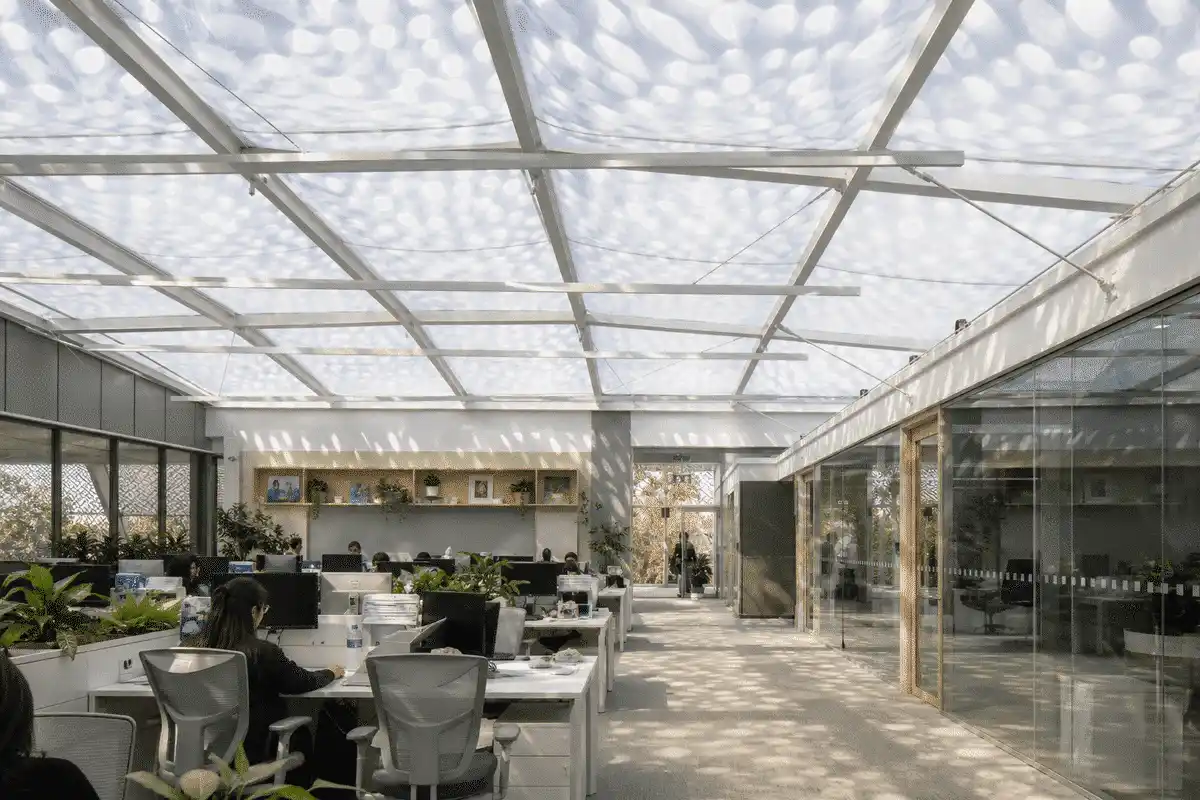 Office lobby with a translucent ETFE ceiling plane — Office Building ETFE Roofing