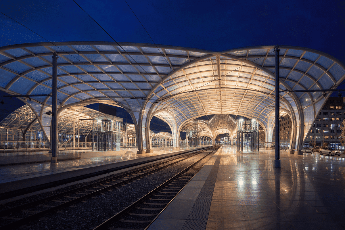 Night view of railway station softly glowing through ETFE roof