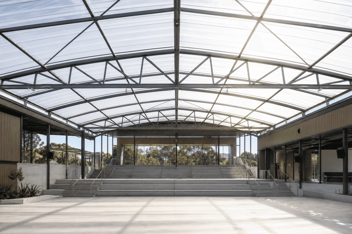 Daylit modern school building with translucent ETFE hall roof
