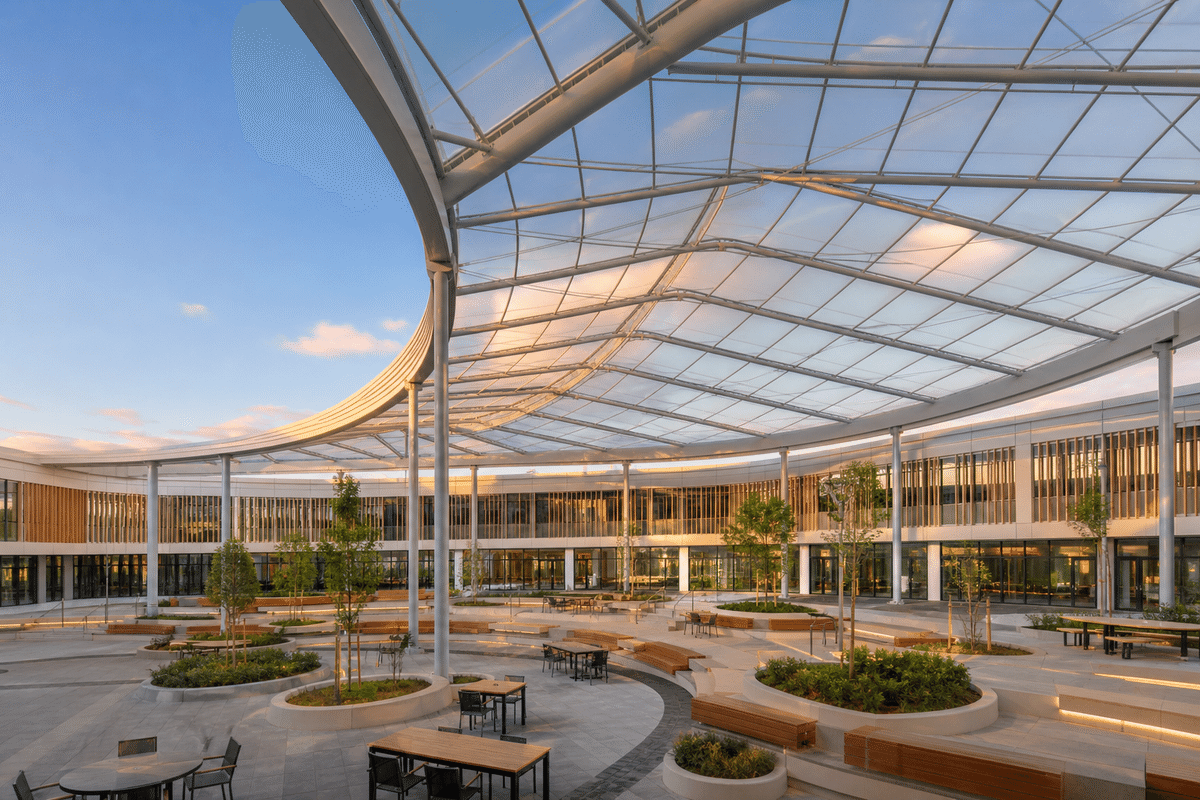 School courtyard with sweeping ETFE skylight roof