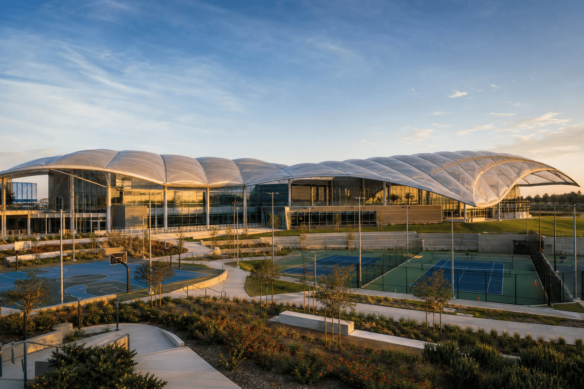 Exterior of a modern sports complex with ETFE roof