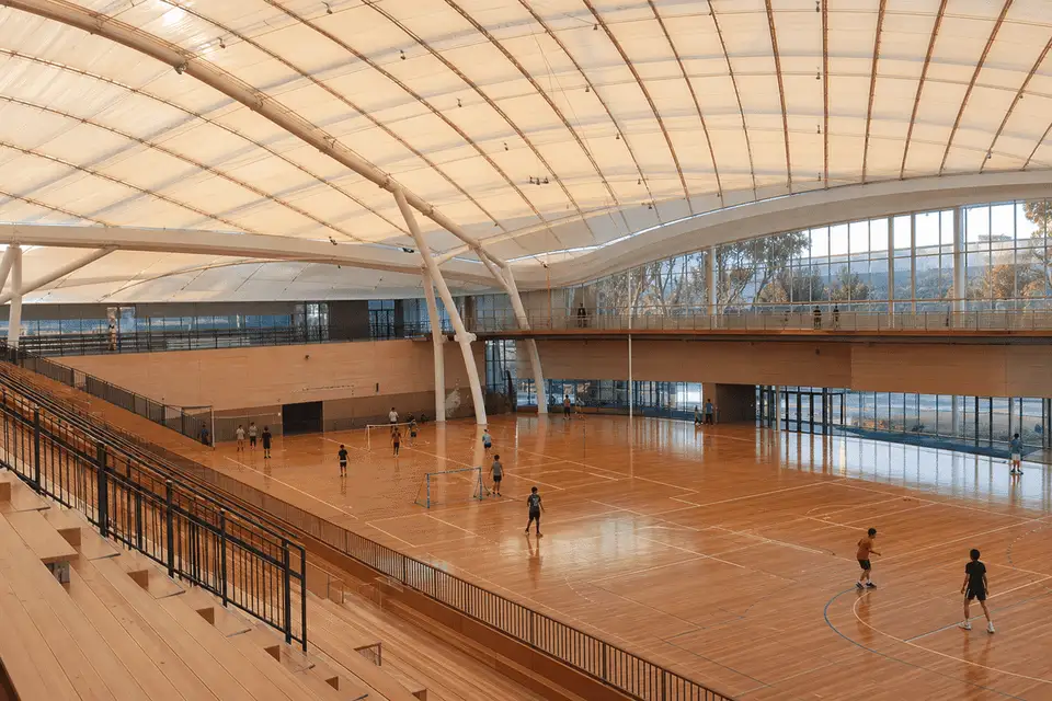 Primary space under a luminous ETFE air cushion roof — Sports Complex ETFE Roofing