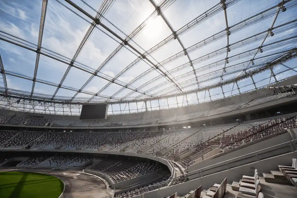 Natural daylight washing stadium seating through an ETFE roof — Stadium ETFE Roofing systems