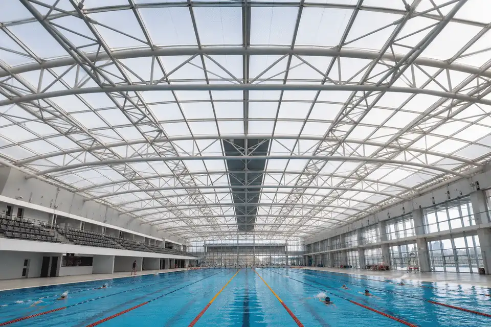 Long-span translucent ETFE roof over an indoor swimming pool hall — Swimming Pool ETFE Roofing systems