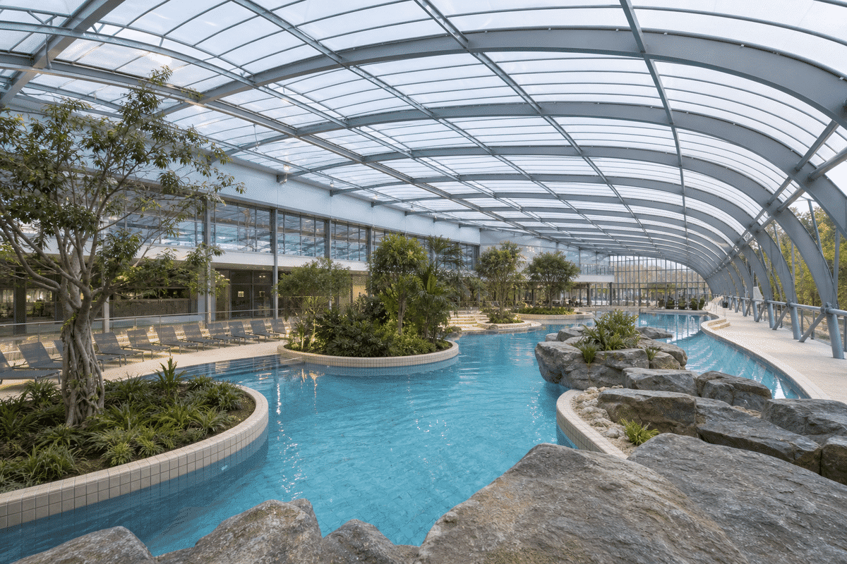 Leisure swimming pool under sweeping ETFE skylight roof