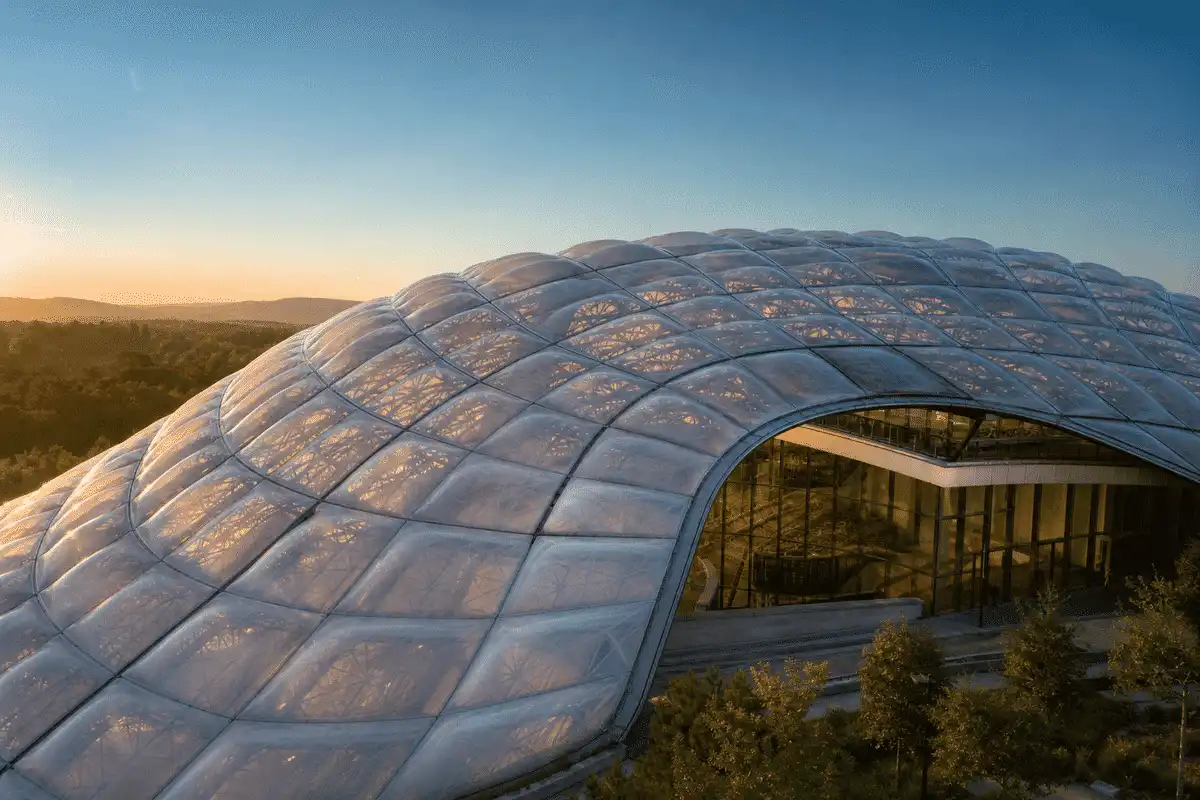 Freeform curved ETFE cushion field on a university atrium — University ETFE Roofing systems