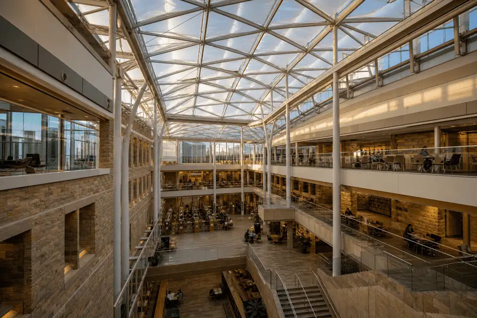 Daylit modern university campus atrium with translucent ETFE roof — University ETFE Roofing systems