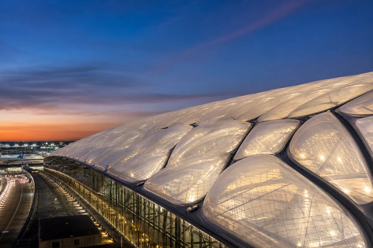 Metro station concourse roof daylit through ETFE air cushions