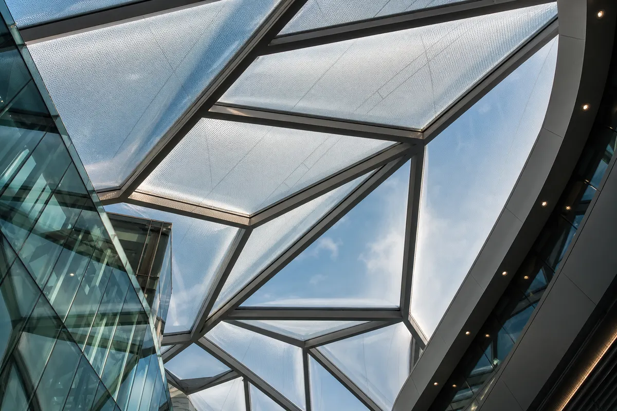 Fritted translucent ETFE cushions filtering soft daylight