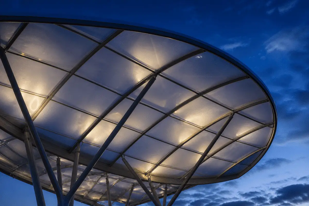 Waterfront pavilion single-layer ETFE sail at sunset — ETFE Single Layer System