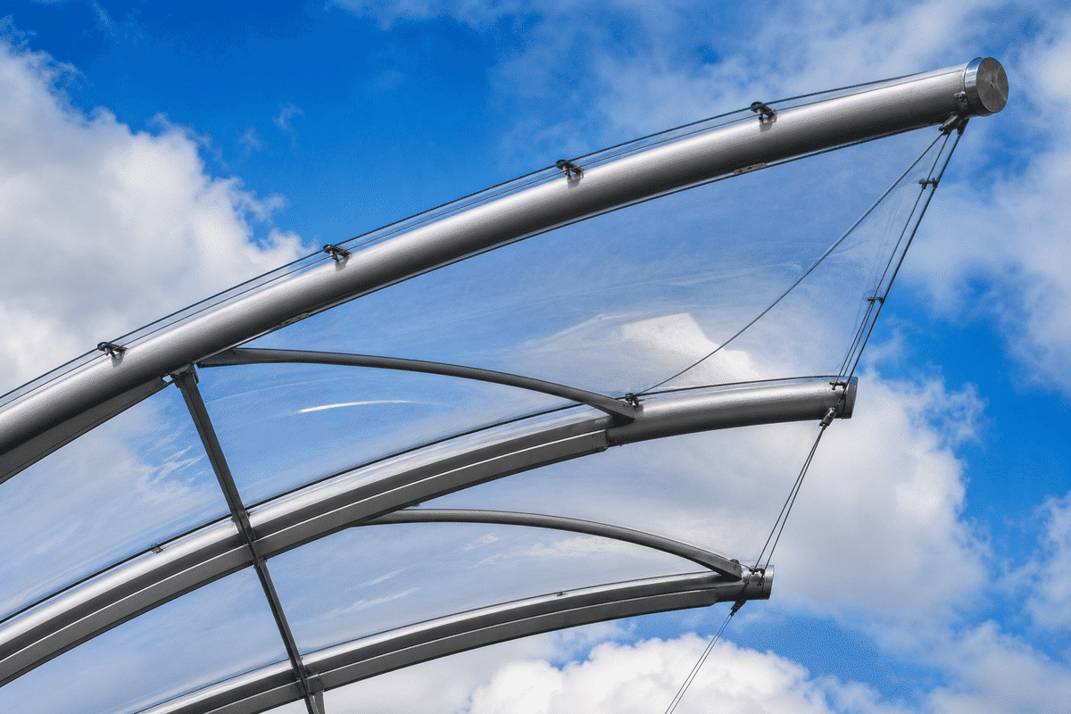 Tensioned single-layer ETFE foil canopy on curved steel masts