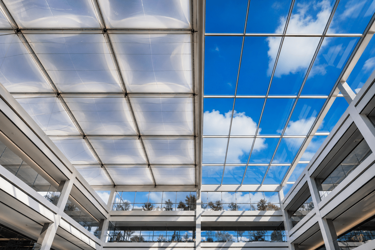 Twin pavilions comparing ETFE pillow roof and glass skylight