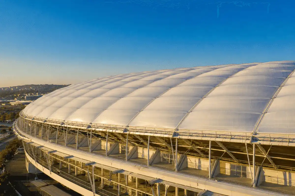 Stadium ETFE cushion roof under clear blue sky — What Is ETFE